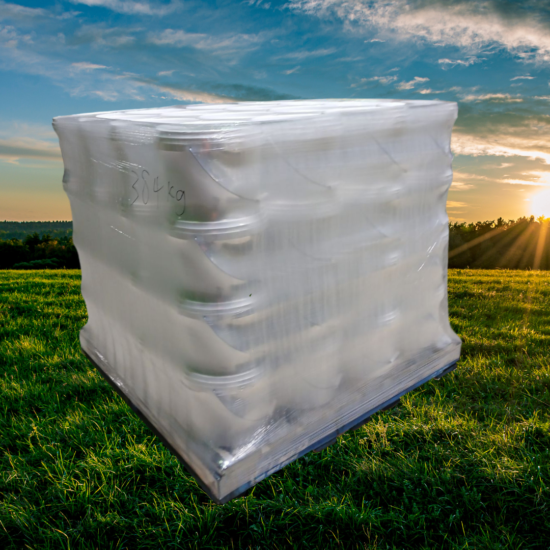 A pallet of white tubs in bulk wrapped in shrink wrap. The background