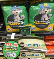 Eco Pawz CleanUp 7 L bags in green and gold, typically Aussie colours, displayed in the pet accessories and pet litter section of an IGA supermarket, showing natural absorbent pet odour and mess control product available nationwide in Australia. Up to 70 uses. #EcoPawzCleanUp #7LBags #IGANationwide #StockistsInPerth #StockistsInSydney #StockistInBrisbane #StockistsInAustralia #AbsorbentPowder #DiatomaceousEarth #AttapulgiteClay #Zeolite #AustralianMade #SustainableMining #PetOdourControl #PetHygiene #EcoFriendly #InternationalMarkets